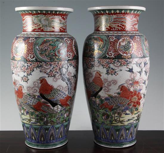 A pair of large Japanese Kutani porcelain ovoid vases, Meiji period, 36.5cm